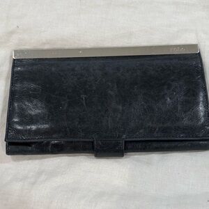 HOBO Maxine Leather
Framed Clutch Wallet in black with silver hardware